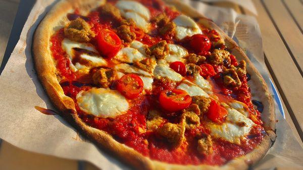 Mozzarella, cherry tomatoes, sausage, drizzled with balsamic vinaigrette