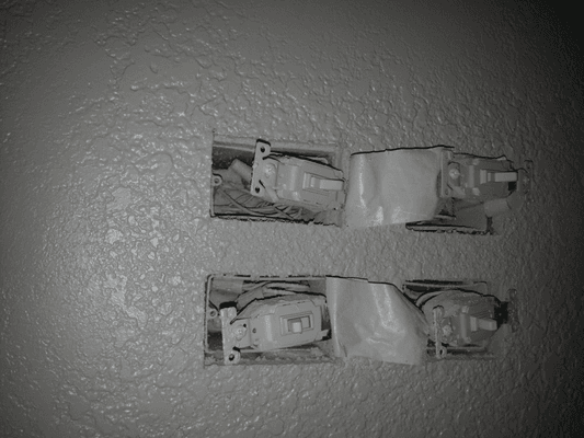 Painted light switches by Kyle Miller. Why do this?  Still this way today.