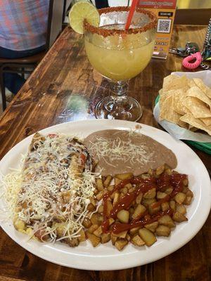 Breakfast omelette, potatoes & refried beans