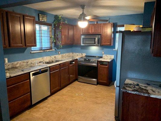 Whole kitchen shot. He even did matching window sills.