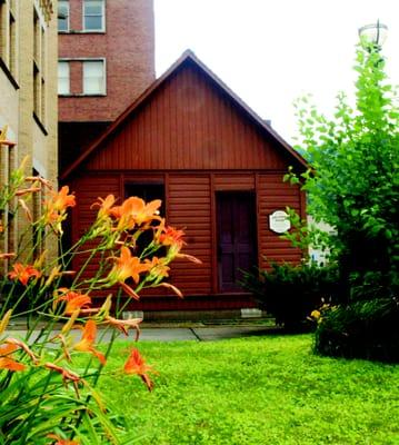 The Oklahoma House, an early form of prefabricated housing used to shelter flood survivors, is part of the museum's exhibit.