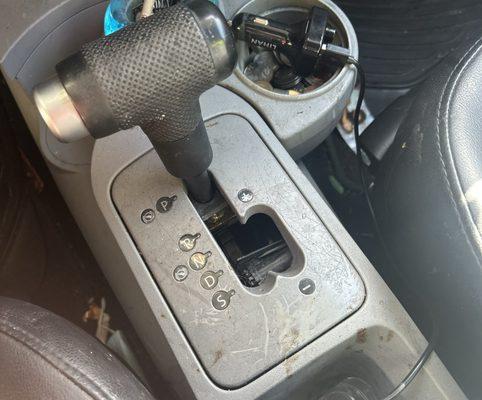 Shifter has hole and won't shift into drive only sport