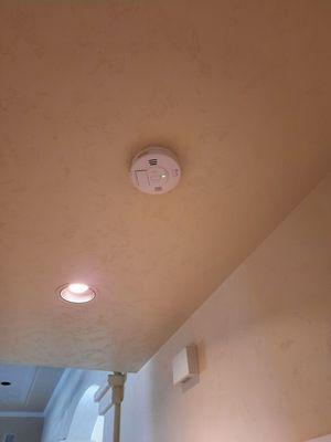 New smoke detectors installation. Smoke detectors should be replaced at least every 10 years.