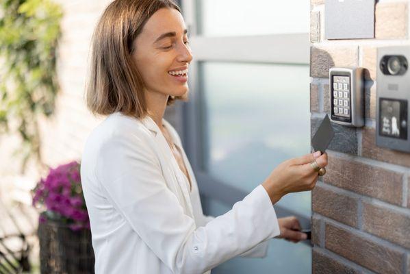 A woman uses an Access Control System by Michael's Keys Locksmith in Colleyville, TX