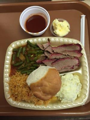 BBQ Brisket, Green Beans, Potato Salad, Spanish Rice, Roll, and a side of BBQ sauce