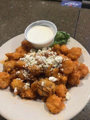 Buffalo fried shrimp topped with Gorgonzola cheese crumbles, with a side of ranch (you can also choose bleu cheese dressing)