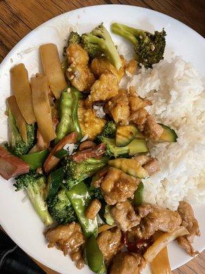 General Tsao's chicken, bbq pork and snow peas and kung pao chicken with steamed white rice.