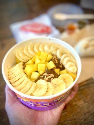 Cedro Acai Bowl-- banana, mango, chocolate chips, almond and drizzle of honey... only available here at KTown location!!