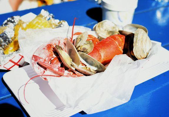 Clam bake: a chick lobster with half pound steamers (steamed clams) + corn cob + clam chowder