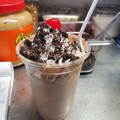 Chocolate Peanut butter cookies and cream Frosty cane