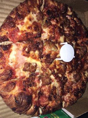 Extra well done meat lovers pizza