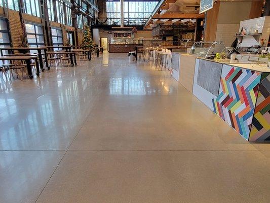 Polished concrete floors that Dancer Concrete Design installed at Union Street Market on the Electric Works campus in Fort Wayne, Indiana.