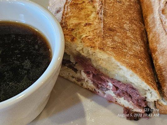 French Dip au jus sandwich.