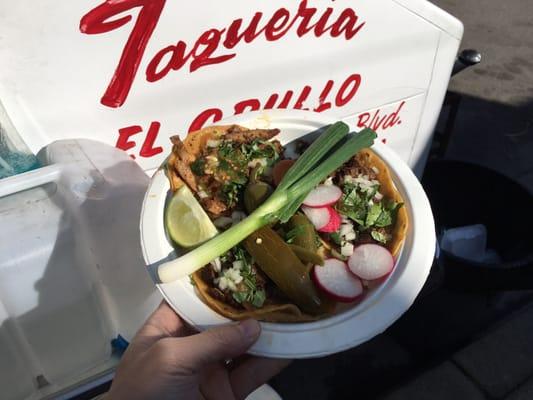 Two al pastor and one carne asada tacos