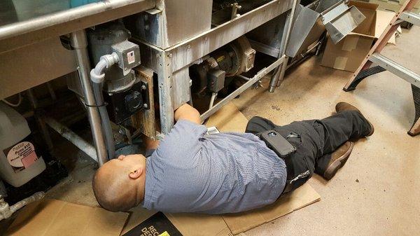 A late night emergency repair on a commercial dishwasher.