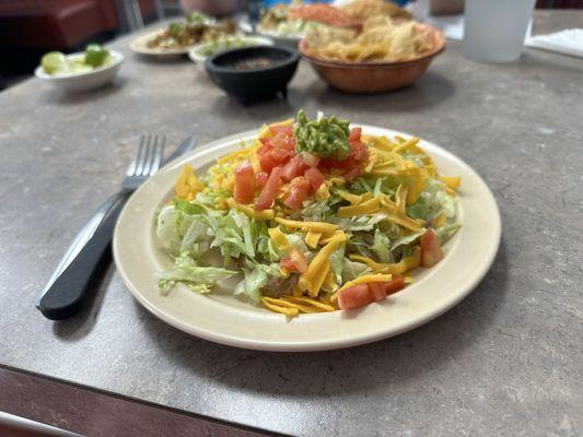 The bean and cheese tostada was simple and delicious. Guacamole was great.