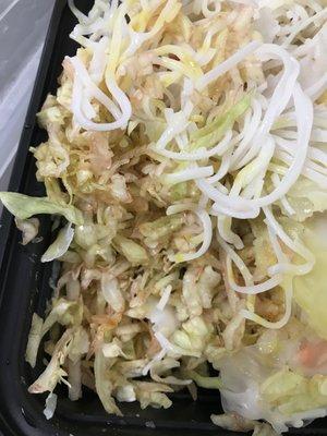 This was inside my shrimp summer roll. Old slimy lettuce and extremely hard cold noodles.