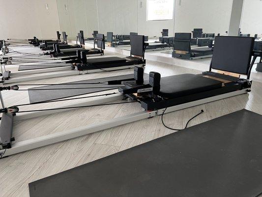 Heated Pilates Reformer workouts help to increase flexibility and improve overall core strength.