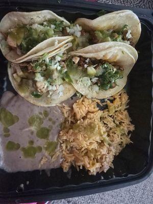 Street tacos with beans and rice