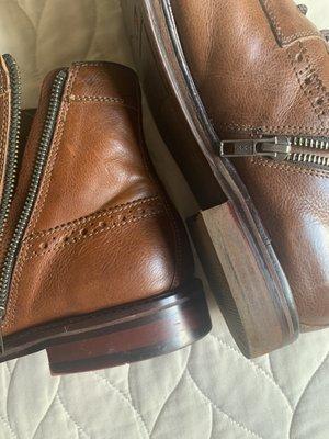 Left- original boot (we have a backup pair and were able to compare), Right- dull redone heel. Lacks same craftsmanship.