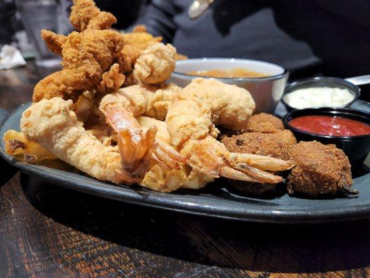 The Louisiana Combo!! Fried Fish, shrimp, etouffe, waffle fries and hush puppies!