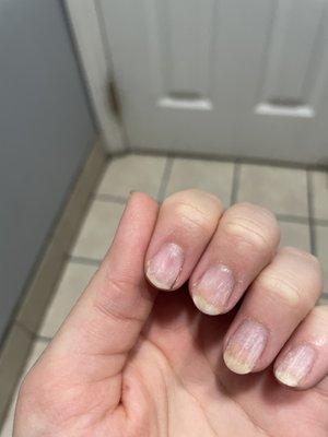 hard to capture on picture but this is what my nails looked like when i left. The red spot is where she grinded my nail almost to the skin