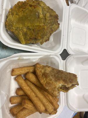 Pastelón empanada, yuca fries, tostones