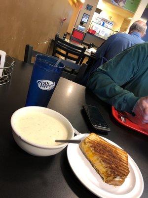 Crab soup and half grill cheese.