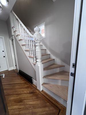 Refacing of and old stairs with new red oak treads and primed risers.