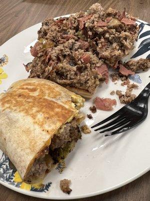 Half of the breakfast burrito and half of the amazing steak bomb sandwich.