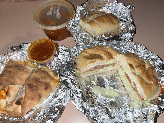 buffalo chicken roll, side meatballs and Italian combo sandwich