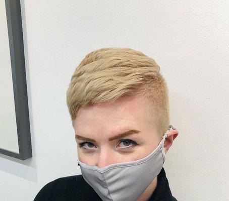 Neutral warm bob, 2 guard clippered sides with blended crown and disconnected top.  Service: all over color and short haircut $145