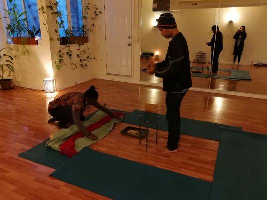 Laura and Nilo setting up puja, "fire ceremony", for 200 Hour Yoga Teacher Training course. Very dedicated to make the experience great.