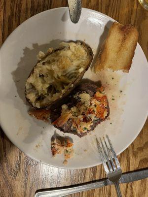 Lobster Colorado (5 oz filet of beef topped with lobster) and Twice-baked Potato.