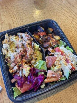 Al Amir bowl w/ saffron rice, Chicken Shawarma & Greek salad.