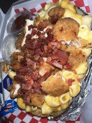 Loaded Baked potato, butter, cheese, Mac&cheese, chicken strips & Bacon.