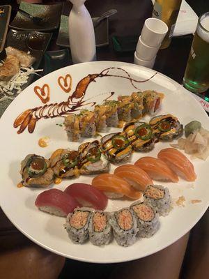 From top to bottom - Pink Dragon Roll, Hot Kiss Roll, Tuna Sushi, Salmon Sushi, Spicy Kani Roll