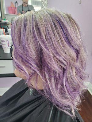 Bright purple low lights with lavender blended in.