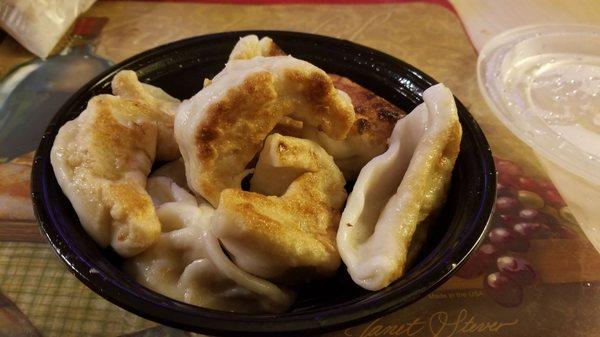 solid plump dumplings, little doughy-soft (under-fried)