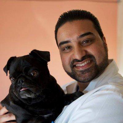 Dr. Raj Gill with his beloved 9yr old pug Lucky!