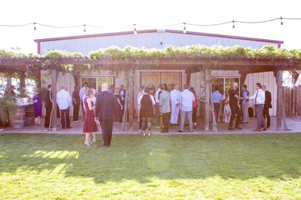 Our guests mingling outside before the ceremony.