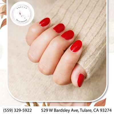 Vibrant red to match the vibe. Let your nails do the talking!