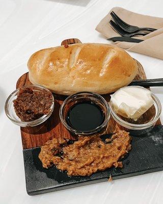 Complementary bread and fixings during dinner service