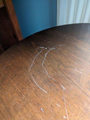 Fresh scratches on our table from the movers