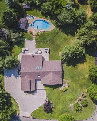 GAF Roof System with Golden Pledge warranty. Cambridge Pavingstones with Armortec masonry driveway and patio. Cultured stone outdoor kitchen