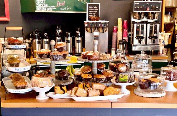 Baked goods from Cheshire baking company on left side of order area - nice assortment, muffins, cakes etc