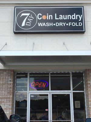 7 Day Coin Laundry Sign - it's located right behind the Liberty gas station on Veteran Pkwy