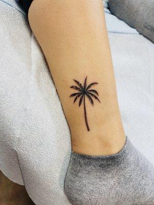 Palm tree tattoo