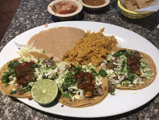 3 carnitas taco plate with rice and beans