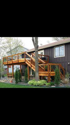 Cedar deck and handrail with Deckorators classic aluminum balusters in Manchester MO.